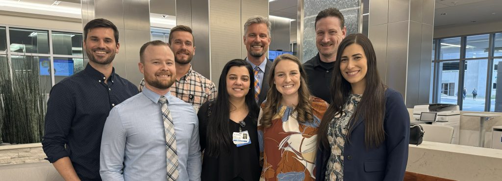 EM Research Symposium 2024 - photo of residents and faculty